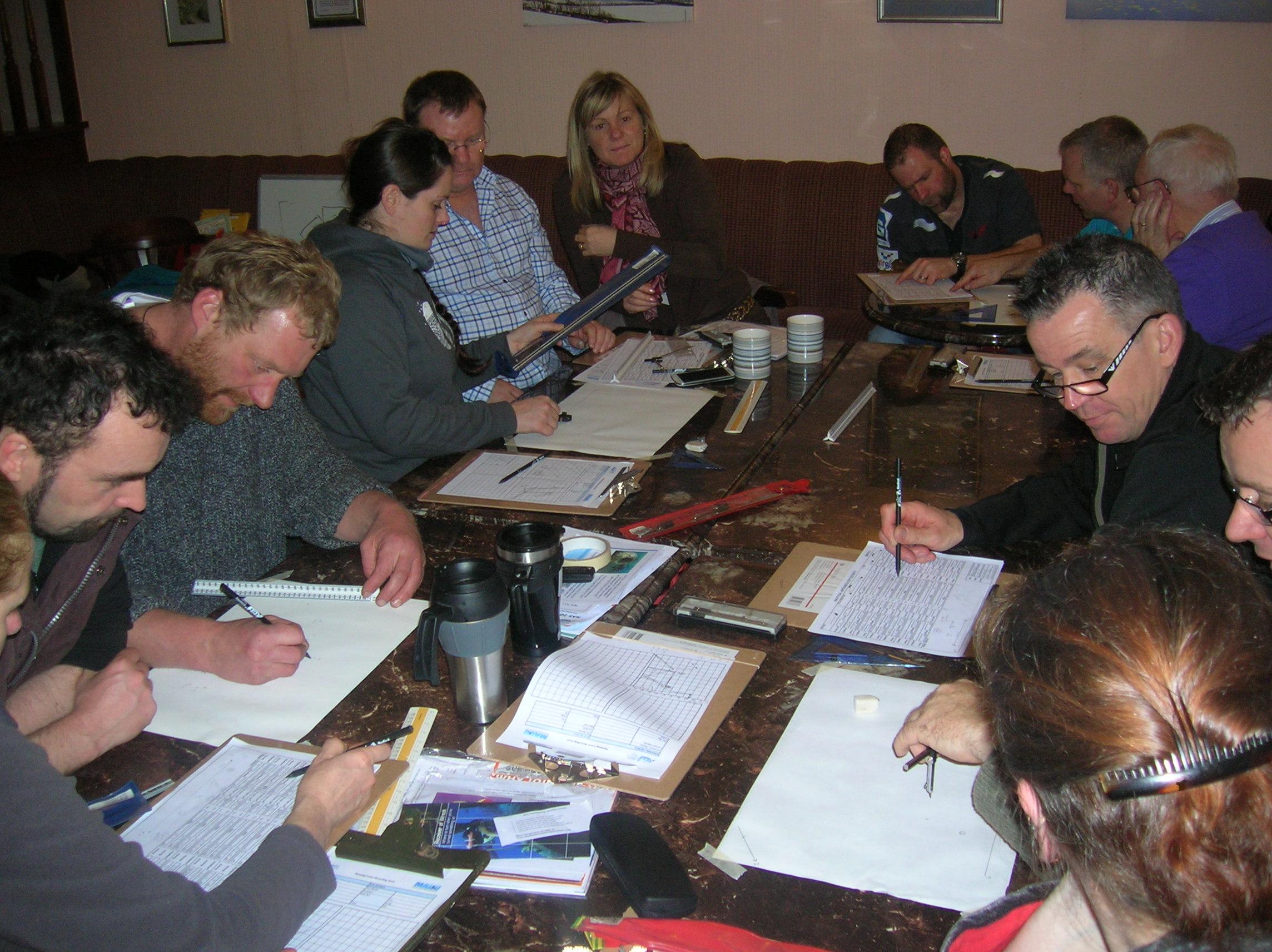 Members of the Ammanford BSAC drawing up their survey results during a NAS course